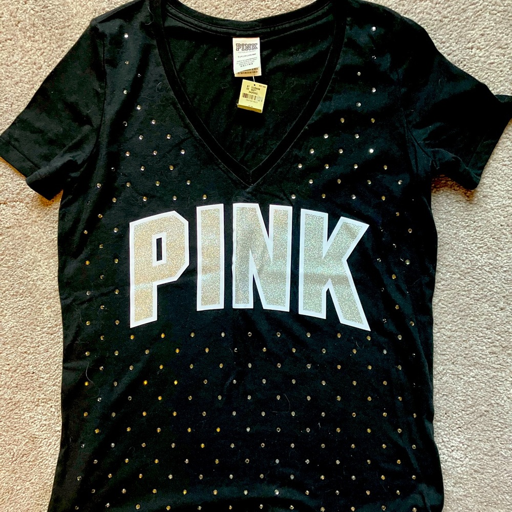 Ladies small “pink” tee